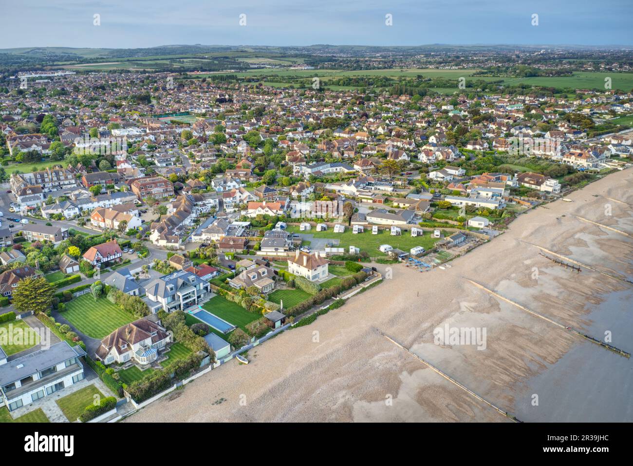 East Preston seafront in West Sussex looking towards Angmering by Sea, Aerial. Stock Photo