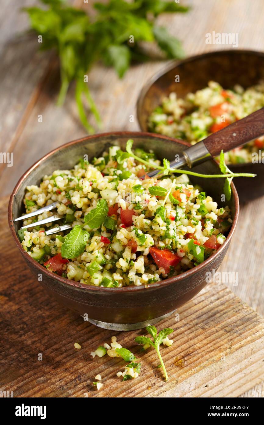 Vegan bulgur salad with parsley and mint Stock Photo Alamy