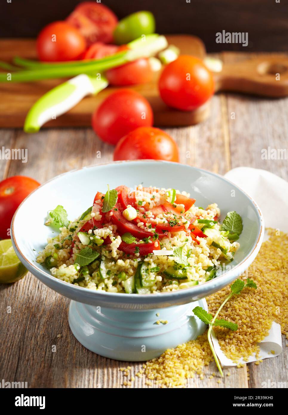 Arabic tomato bulgur salad with cucumbers and mint Stock Photo - Alamy