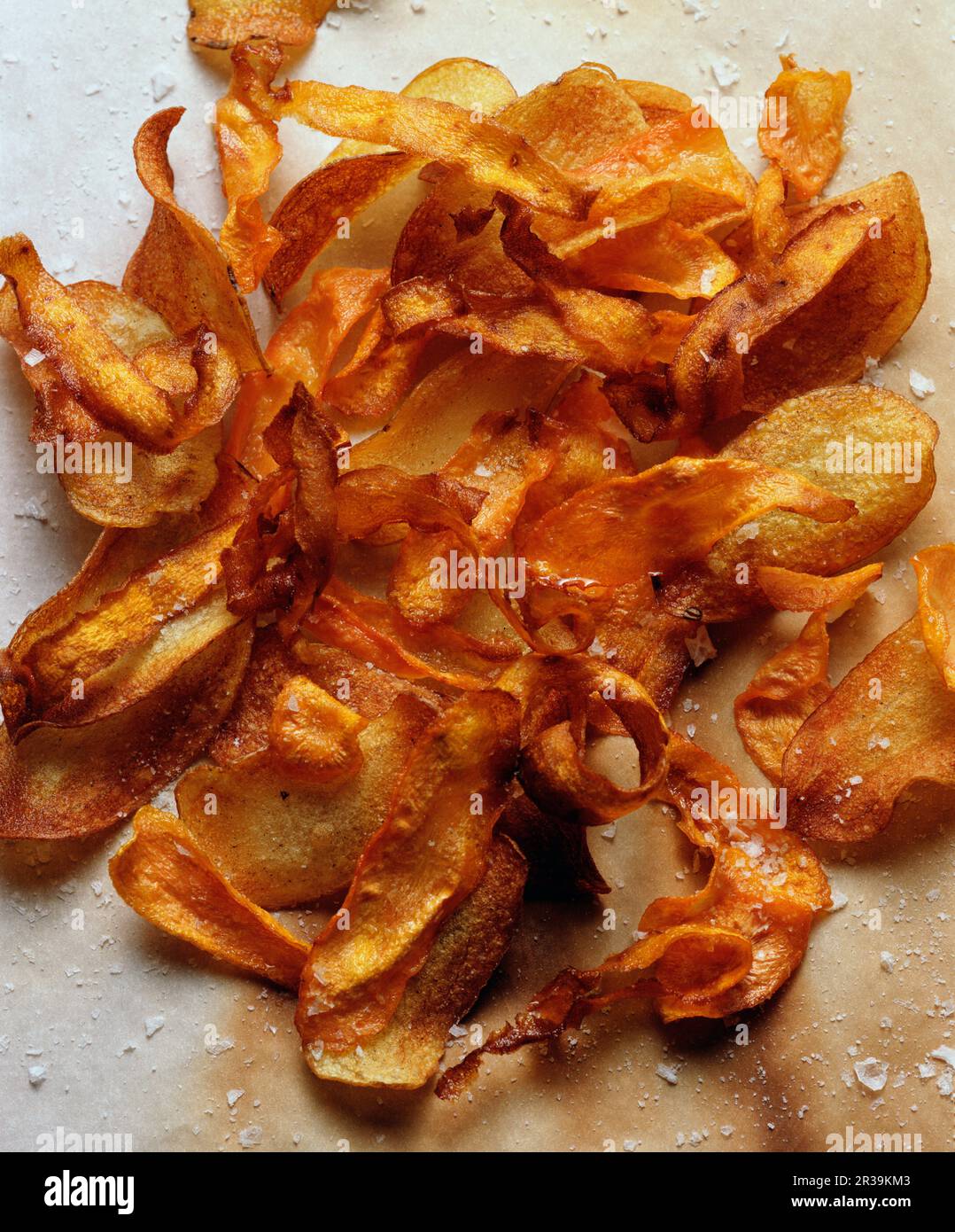 Homemade potato crisps (seen from above) Stock Photo