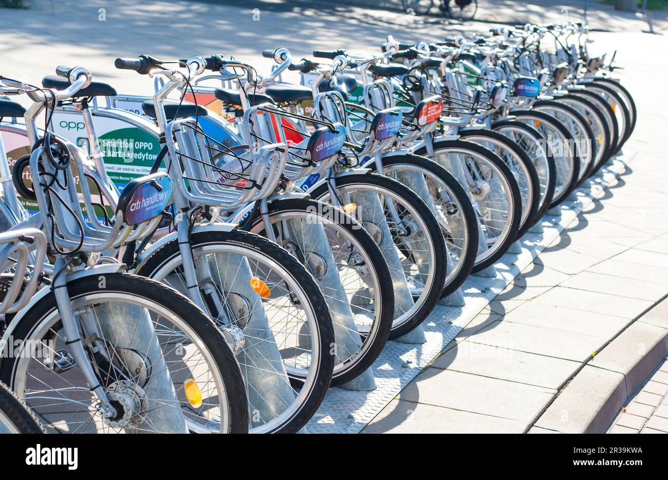 City bicycles parked in a row Stock Photo