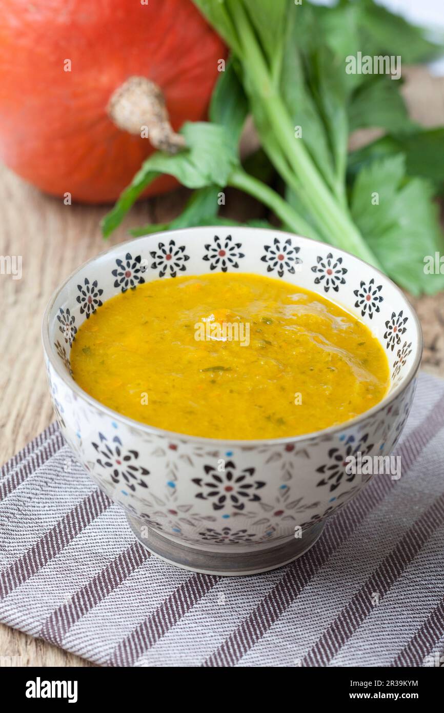 Cream of pumpkin soup with celery Stock Photo Alamy