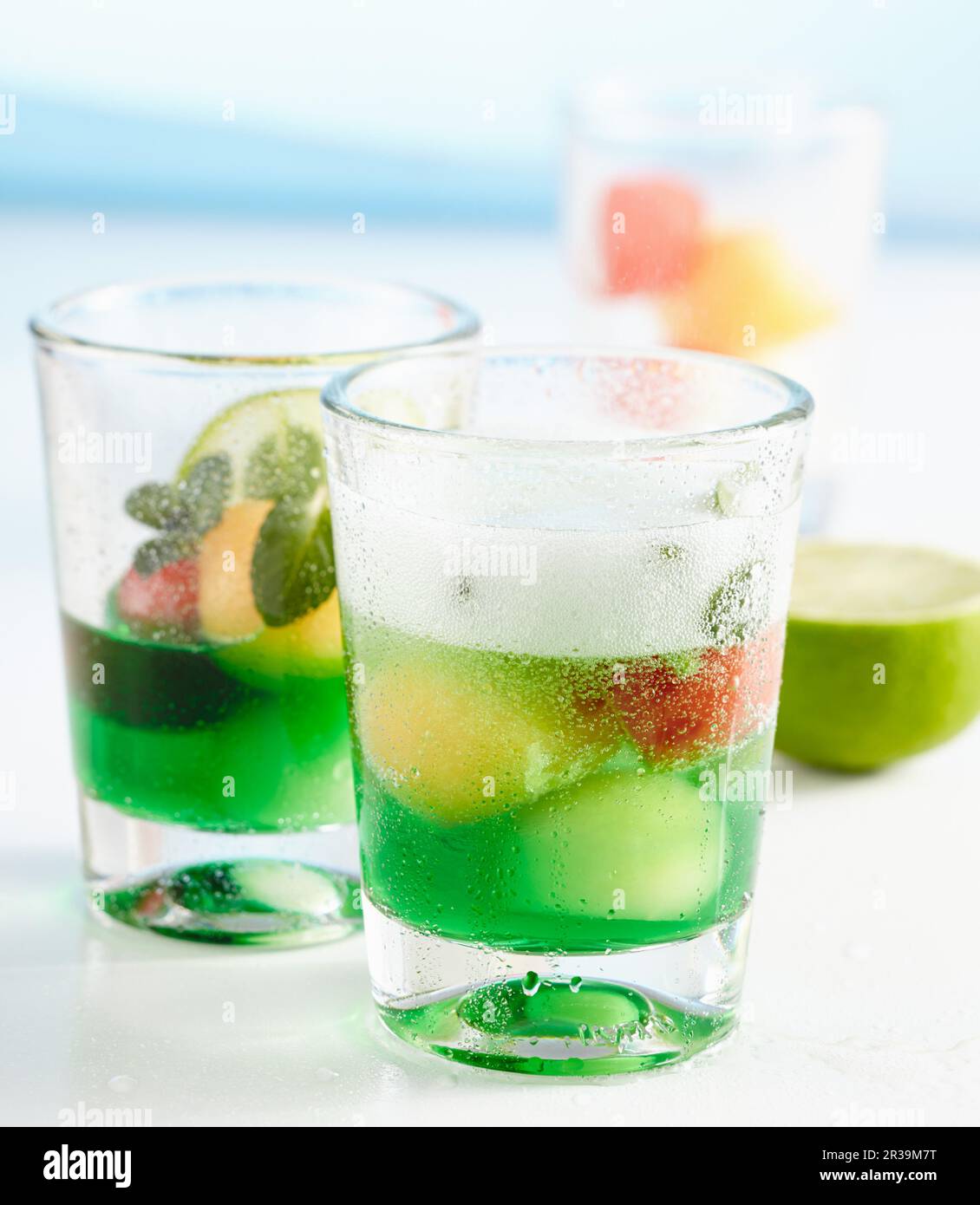 Non-alcoholic melon and mint punch served in glasses with melon balls Stock Photo