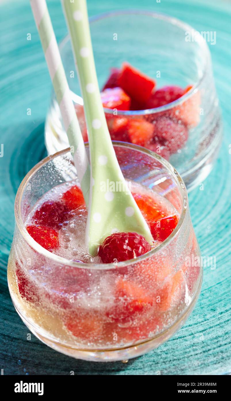 Non-alcoholic fruit punch with ginger ale, strawberries and raspberries Stock Photo