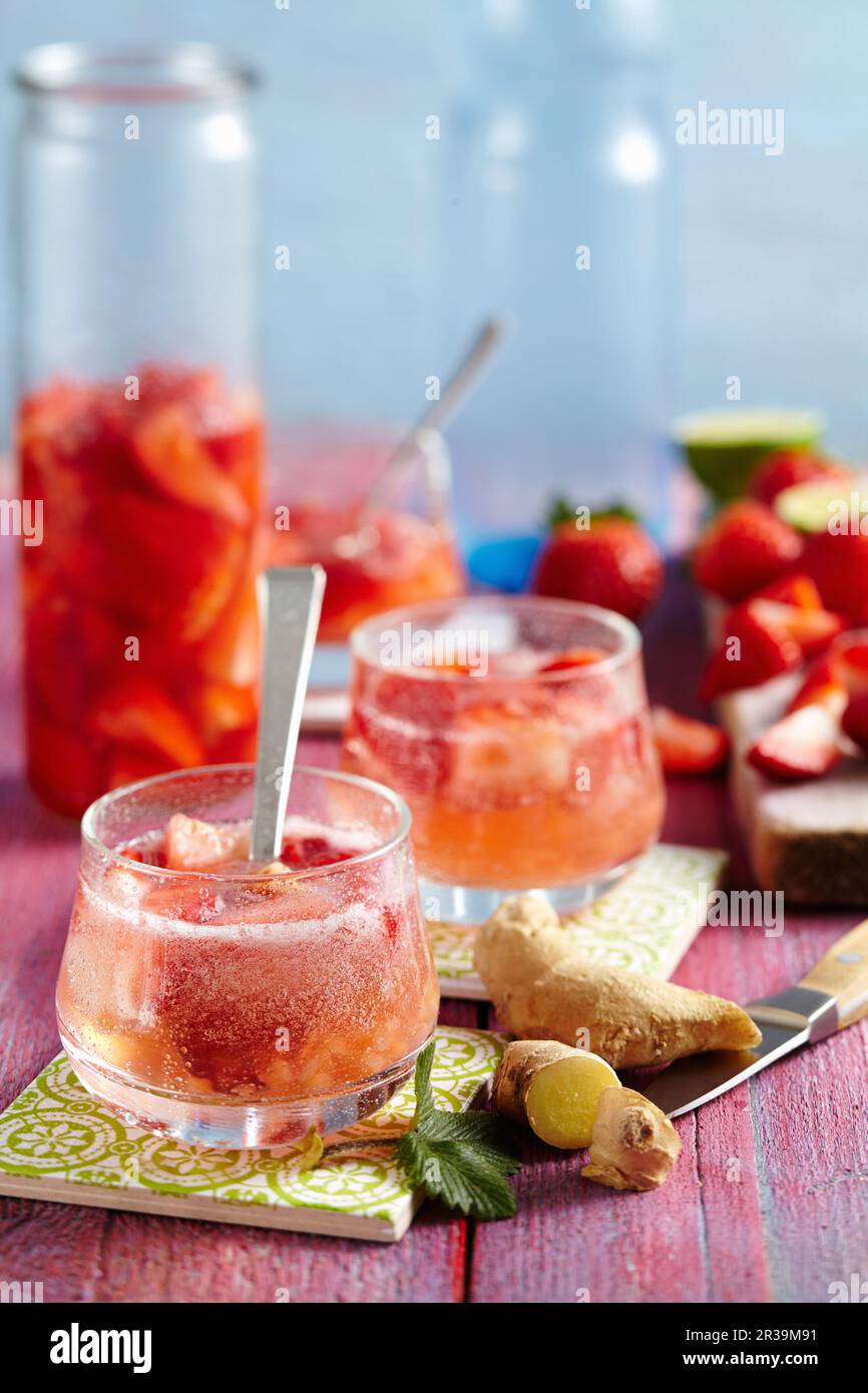 Non-alcoholic strawberry punch with ginger and lime Stock Photo