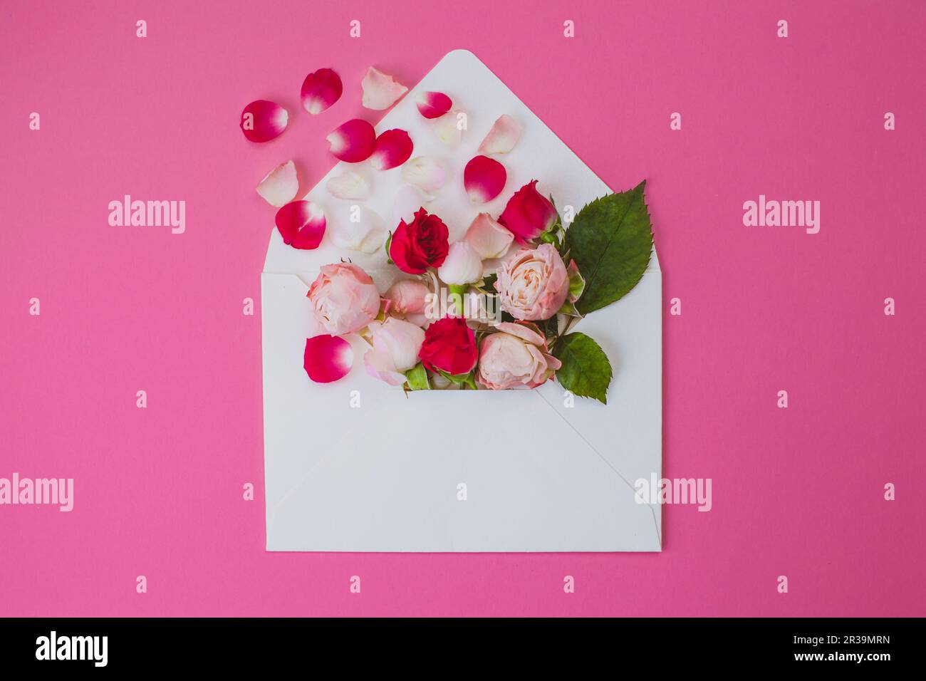 Greeting card with roses flowers in an envelope. Valentine letter with ...