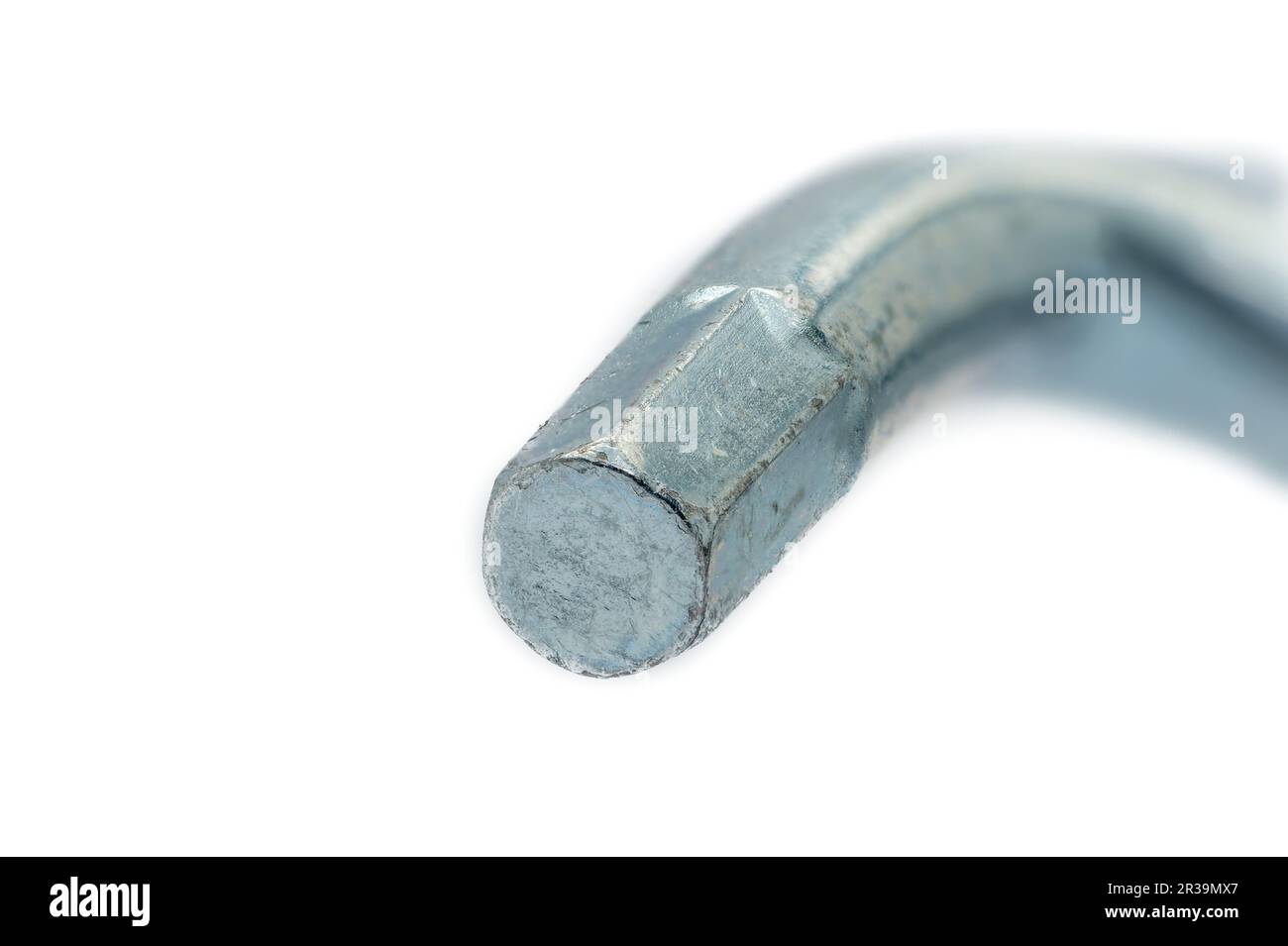 Single hex key on white background, macro close up. Stock Photo