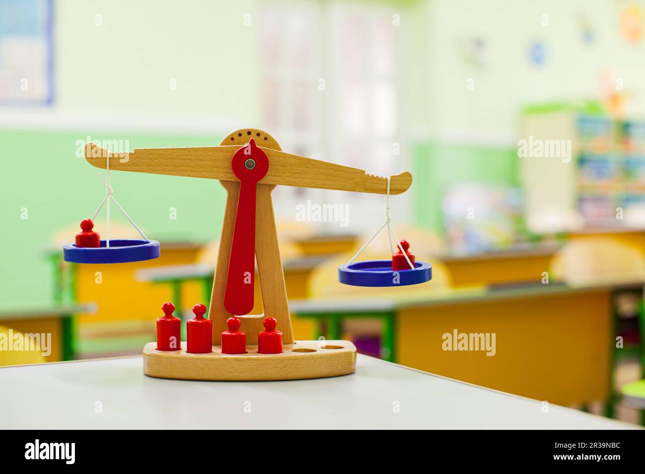 Montessori wooden scale at primary school room Stock Photo