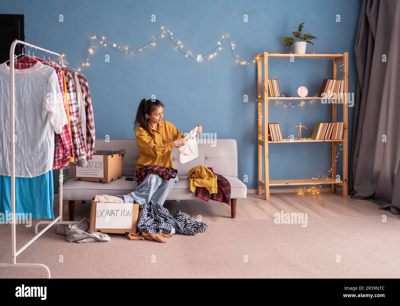 Donating clothes hi-res stock photography and images - Alamy