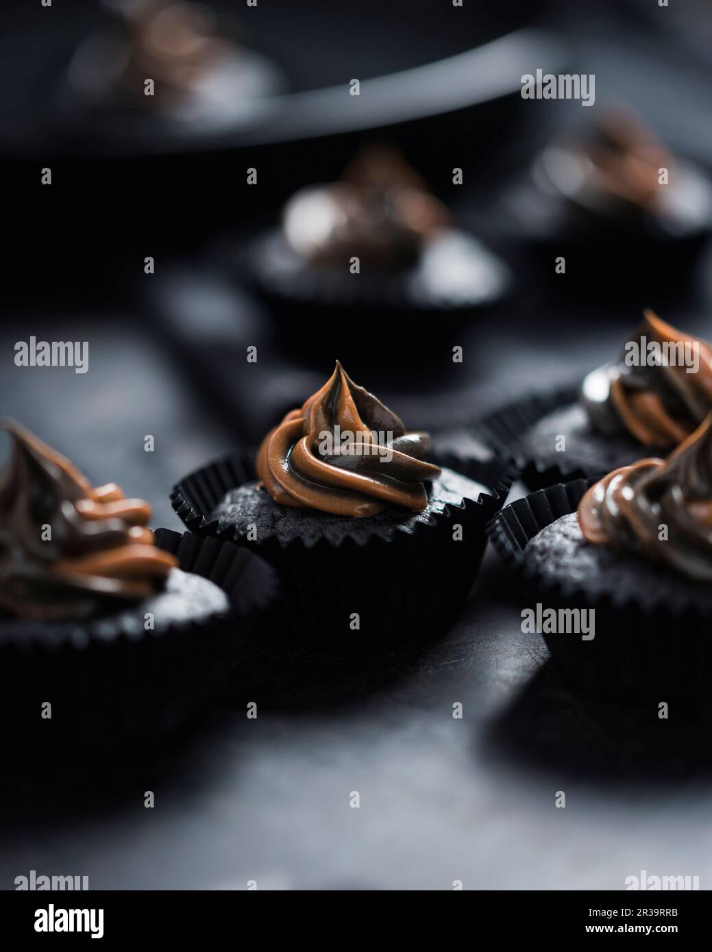 Vegan blood orange cupcakes, coloured with active charcoal with two ...