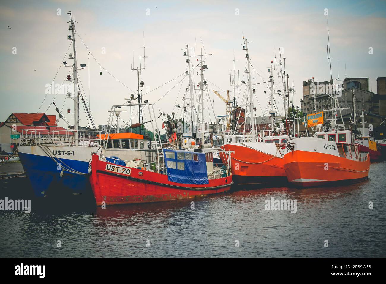 Fishing boats moored in port Stock Photo