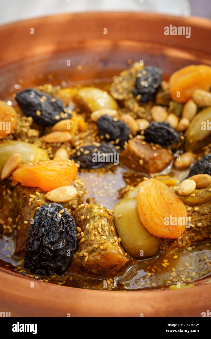 beef tagine with pears, plums and almonds, Berbari Moroccan cuisine