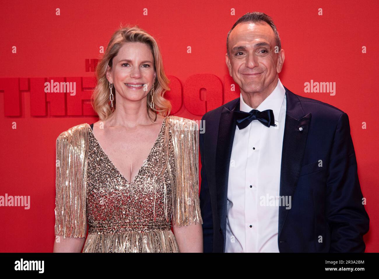 Hank Azaria and Katie Wright pose for photographers upon arrival at