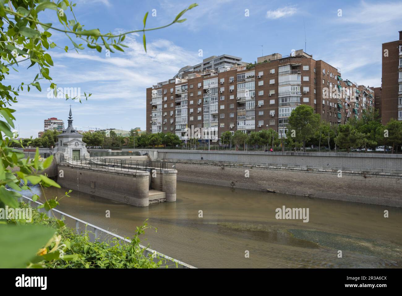 Views of the Manzanares riverbed, lock with a bridge in the center of Madrid Stock Photo