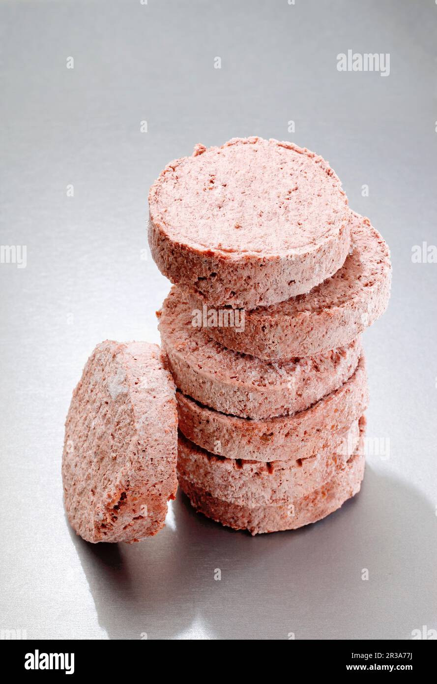 Stacked frozen hamburger patties Stock Photo Alamy