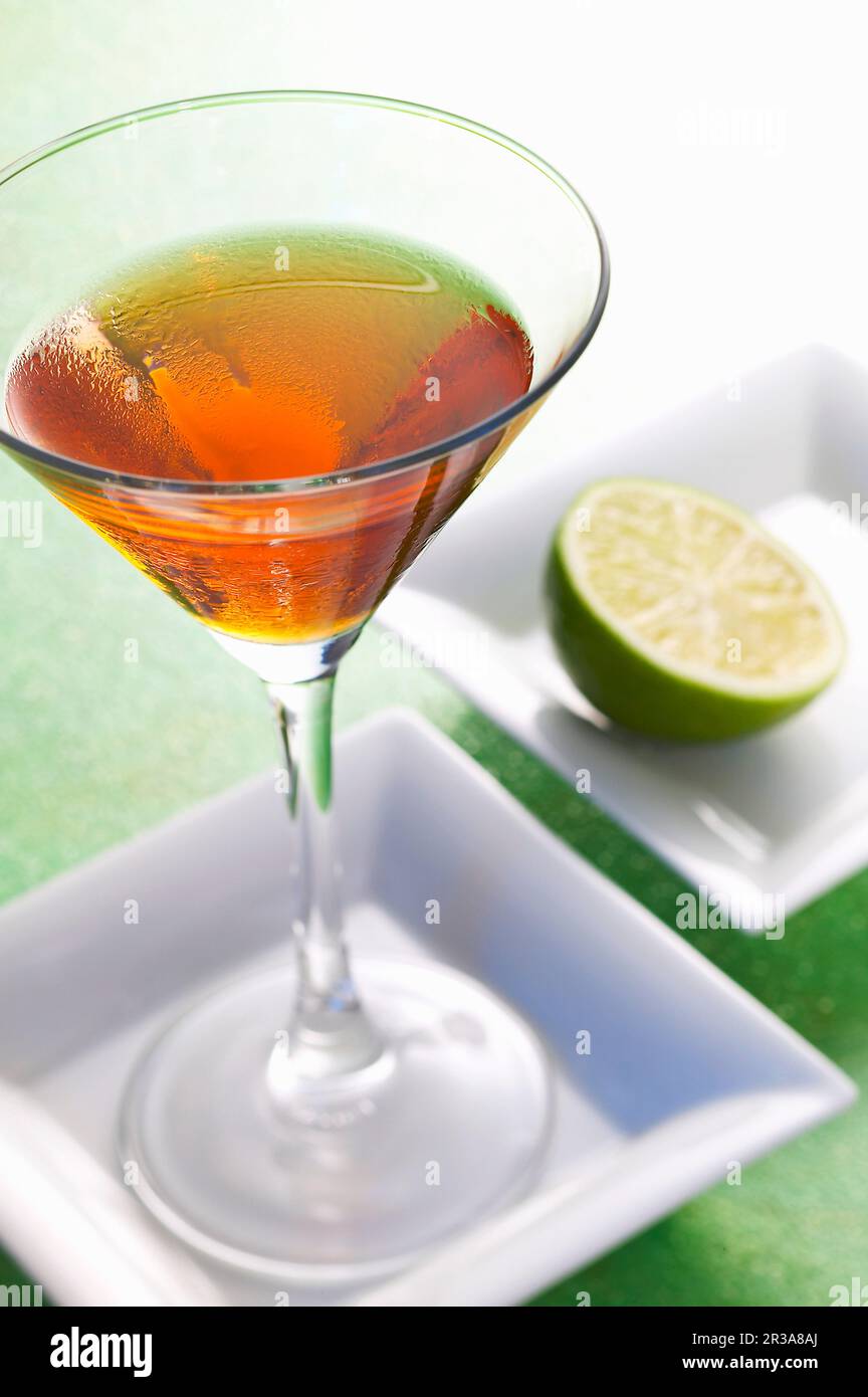 Charivari a cocktail with gin, martini bianco, aperol and sparkling