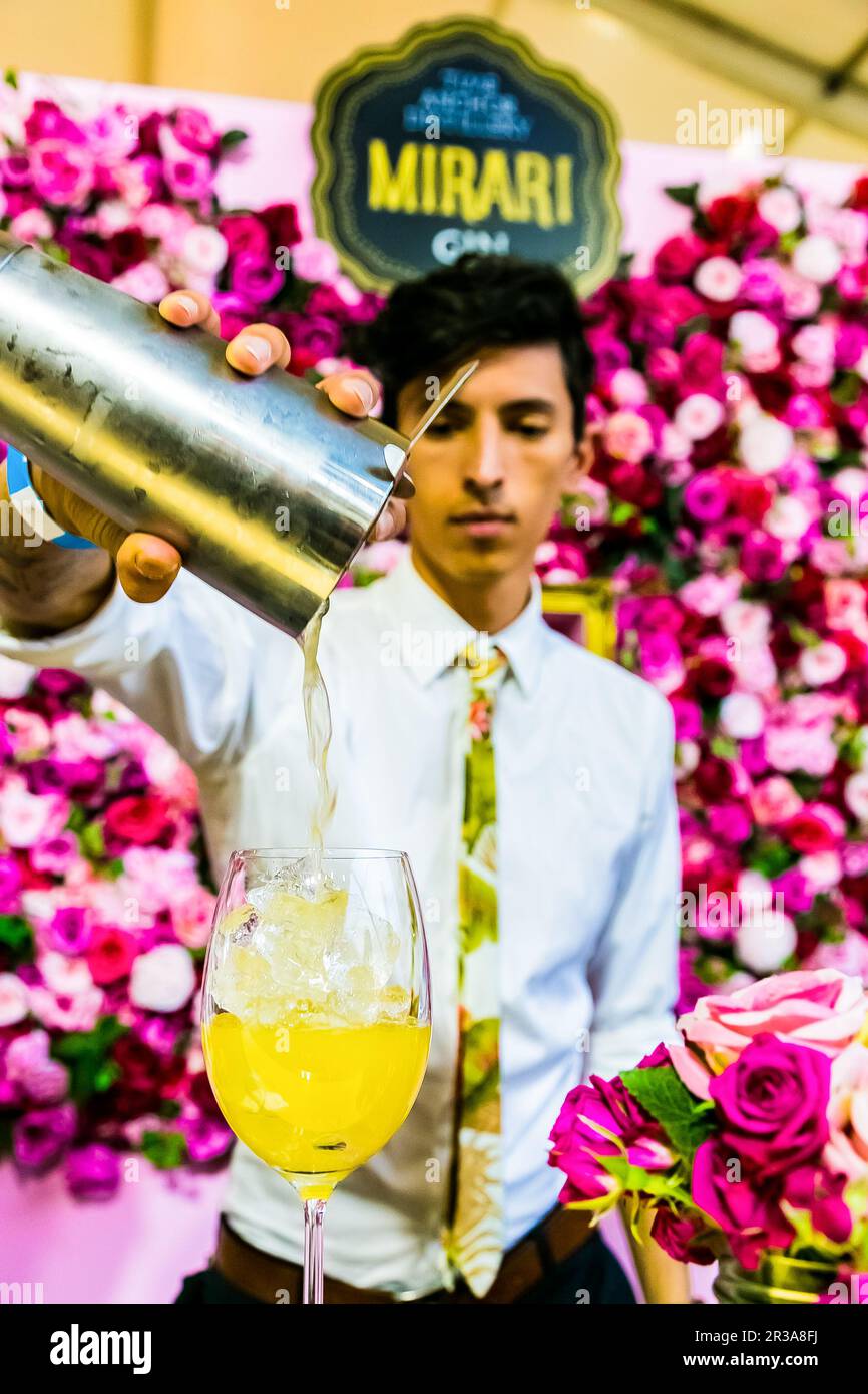 Bartender pouring a Fruity cocktail at food festival Stock Photo