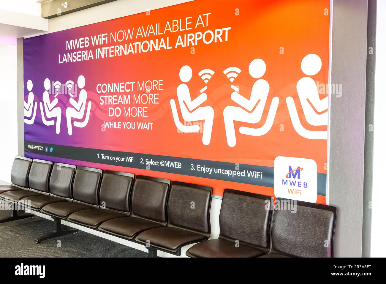 Interior of small departure lounge boarding area at Lanseria