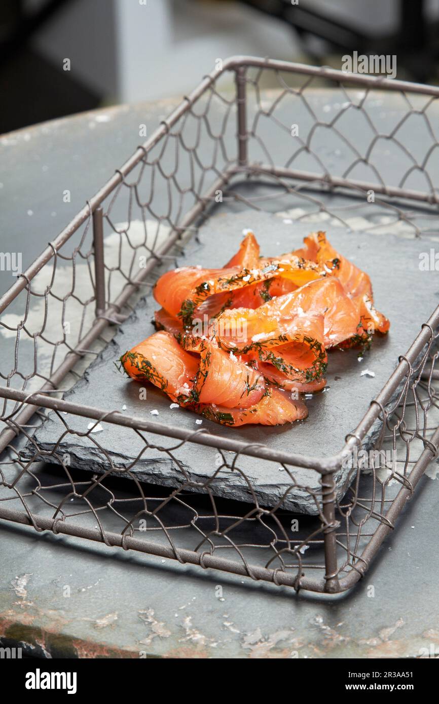 Smoked salmon in a grill basket Stock Photo Alamy