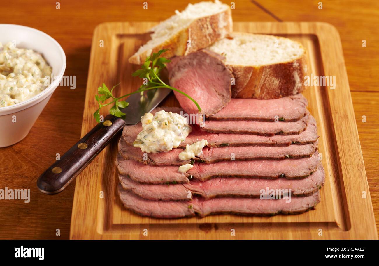 Cold roast beef in slices with baguette and remoulade sauce Stock Photo