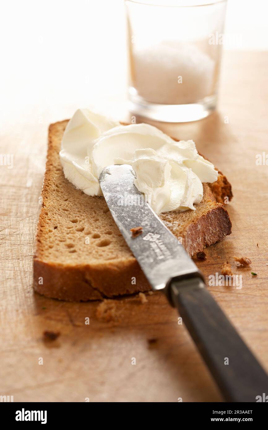 Farmhouse bread with cream cheese Stock Photo