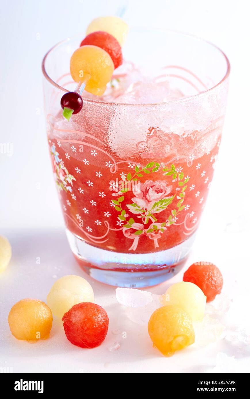Rose-scented watermelon lemonade with melon balls Stock Photo