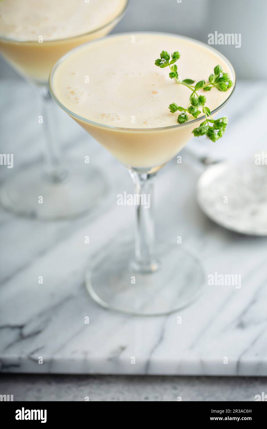 Pineapple egg white fizz cocktail with rum Stock Photo Alamy