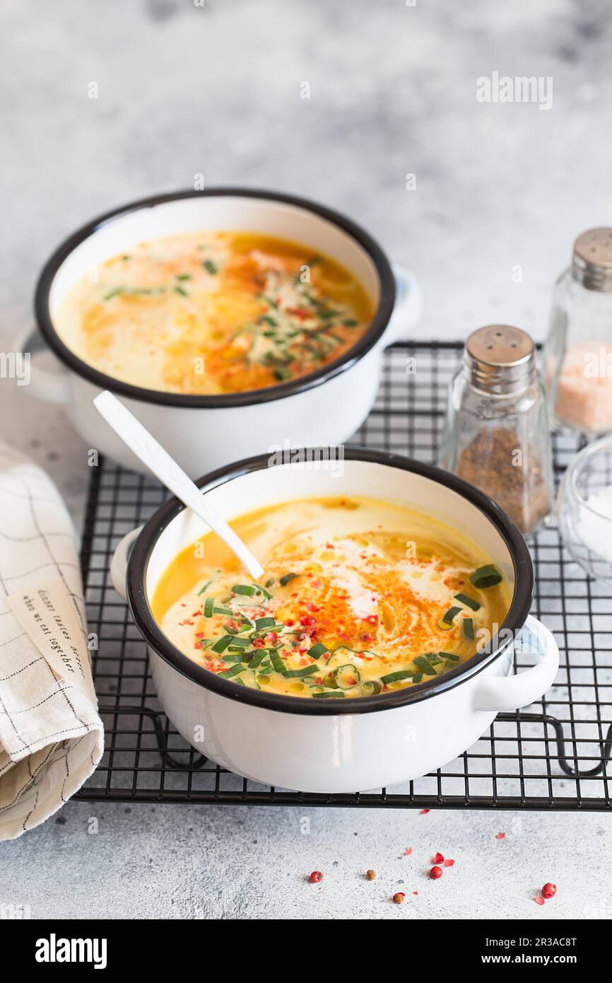 Pumpkin cream soup. Roasted pumpkin and carrot puree soup with turmeric