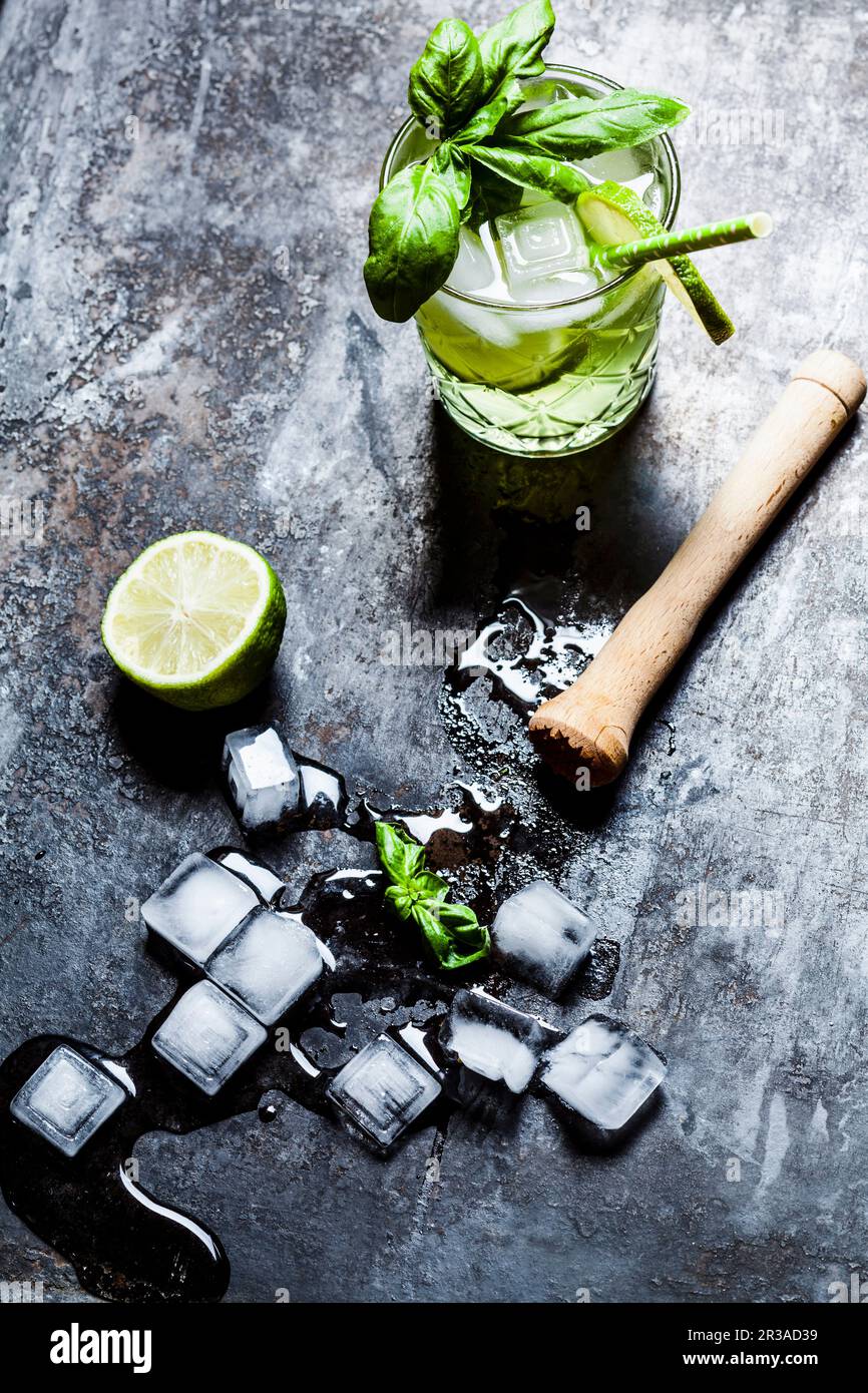 Gin basil smash with lime Stock Photo Alamy