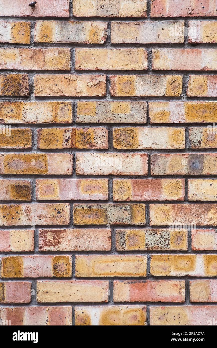 Orange grunge brick wall background texture for design Stock Photo - Alamy