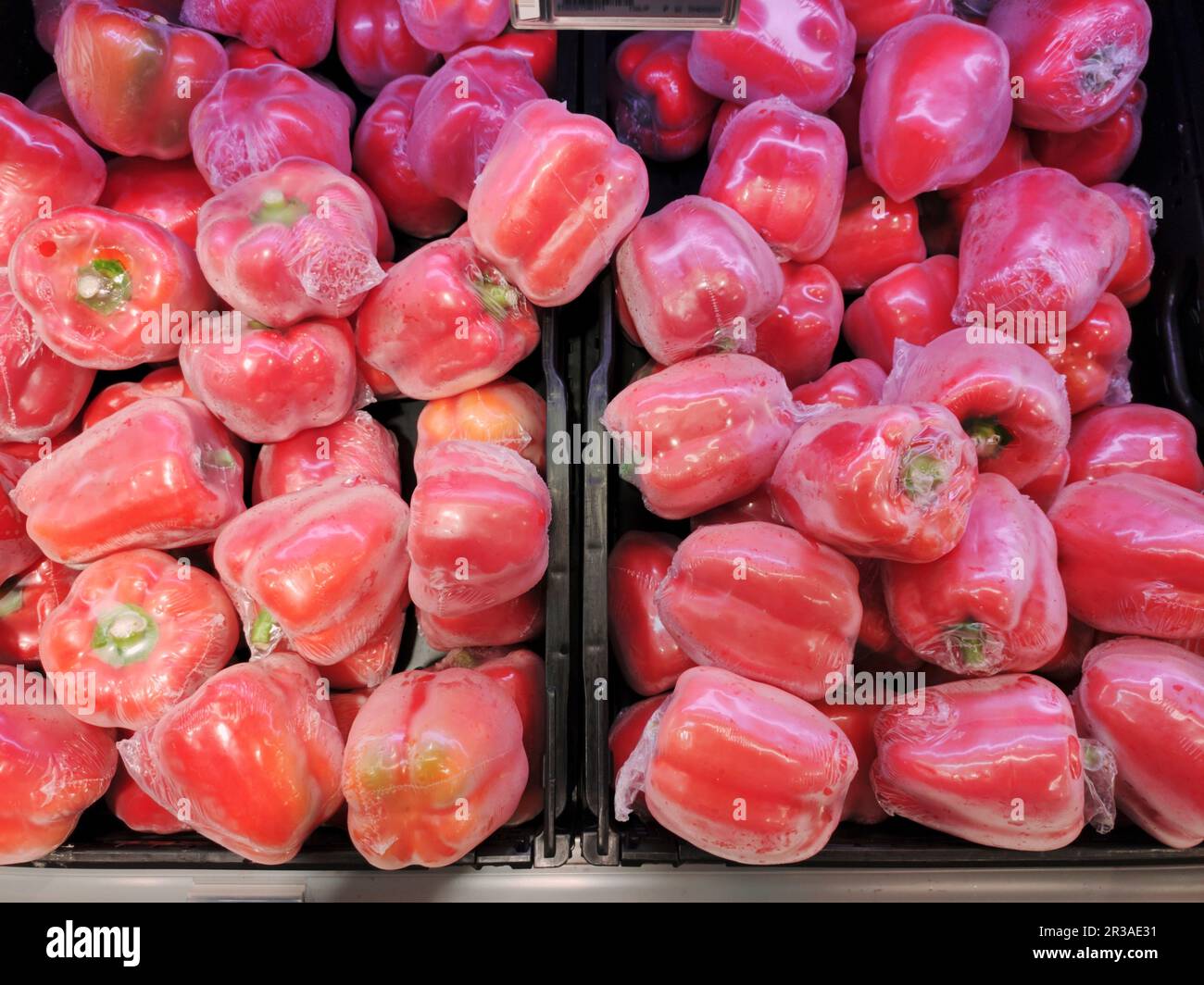 Red peppers in plastic Stock Photo Alamy