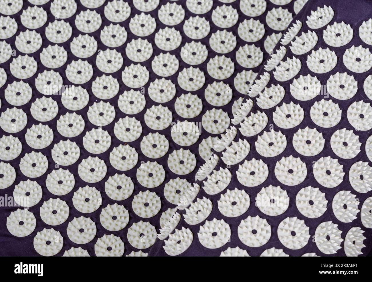 Acupuncture mat with pillow and white massage tips, massage mat for relaxation and treatment 01 Stock Photo