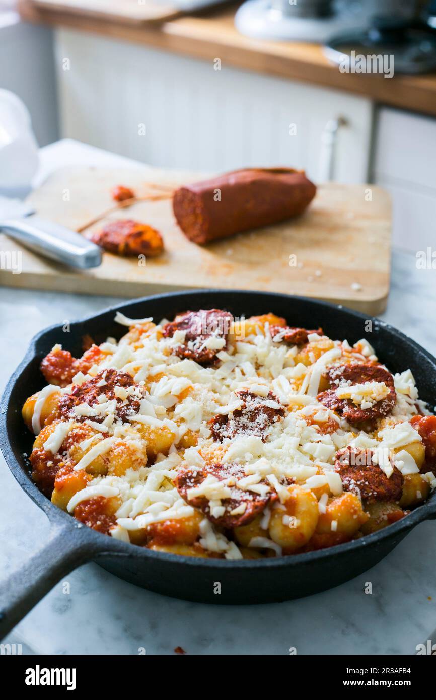 Unbaked gnocchi with chorizo Stock Photo