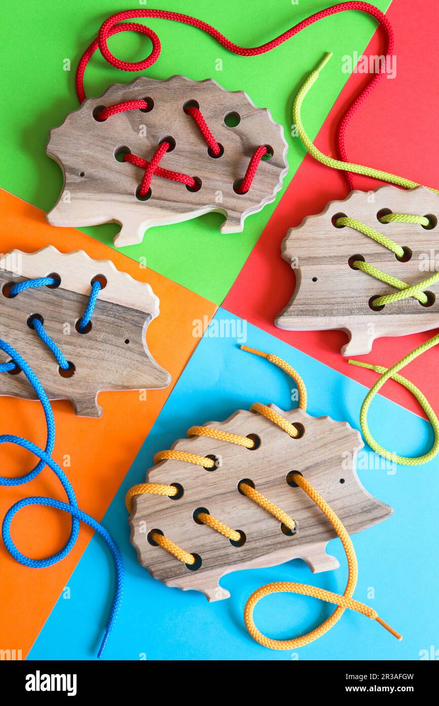 Natural wooden lacing toy hedgehog for educating fine motor skills