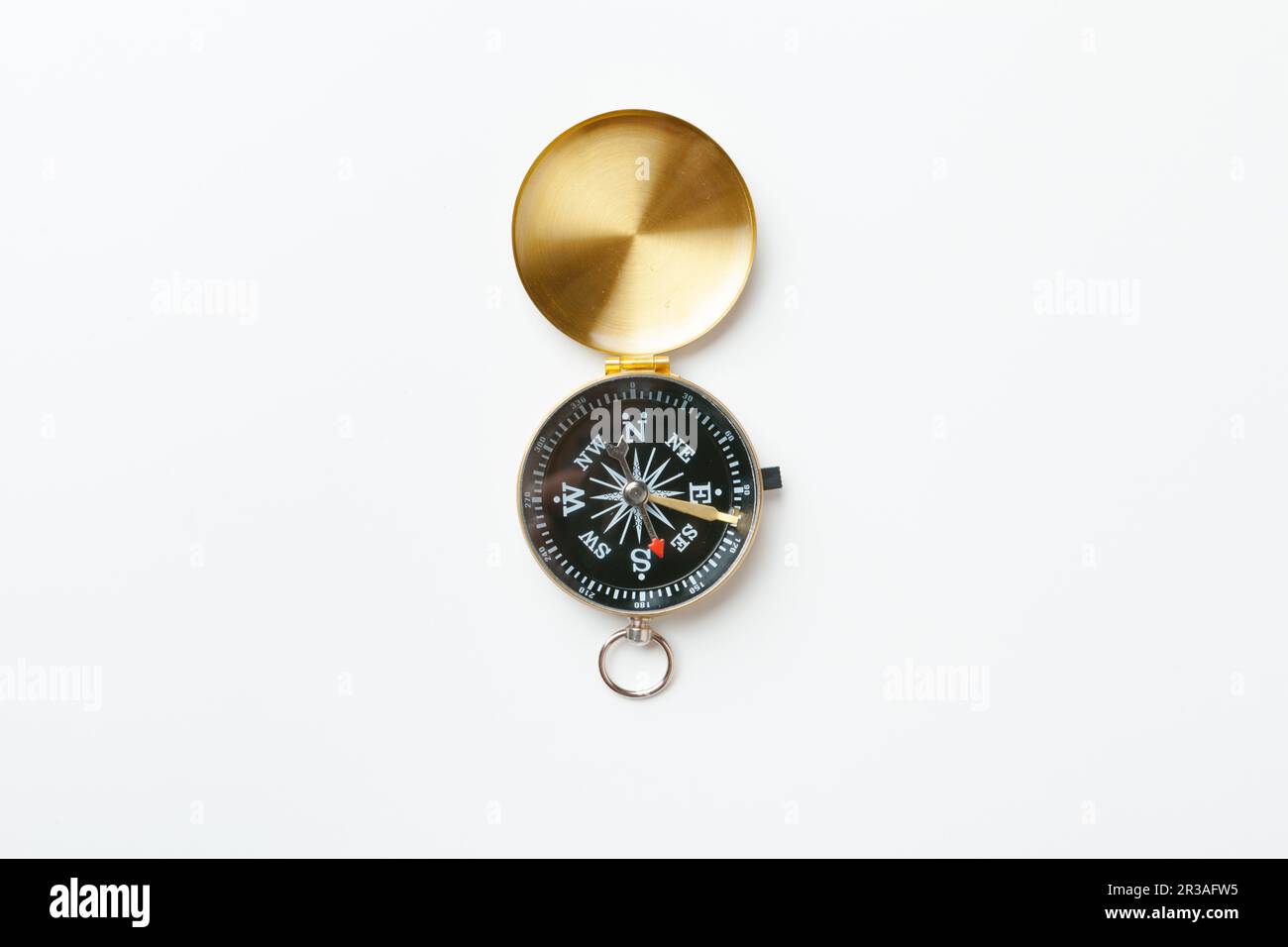 Golden vintage compass isolated on white background Stock Photo - Alamy