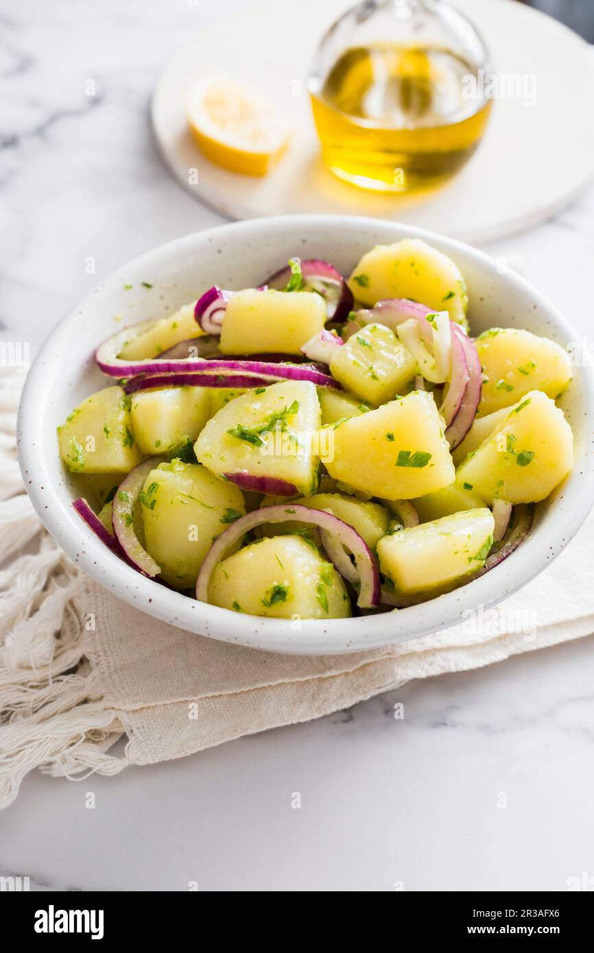 Potato and red onion salad Stock Photo Alamy