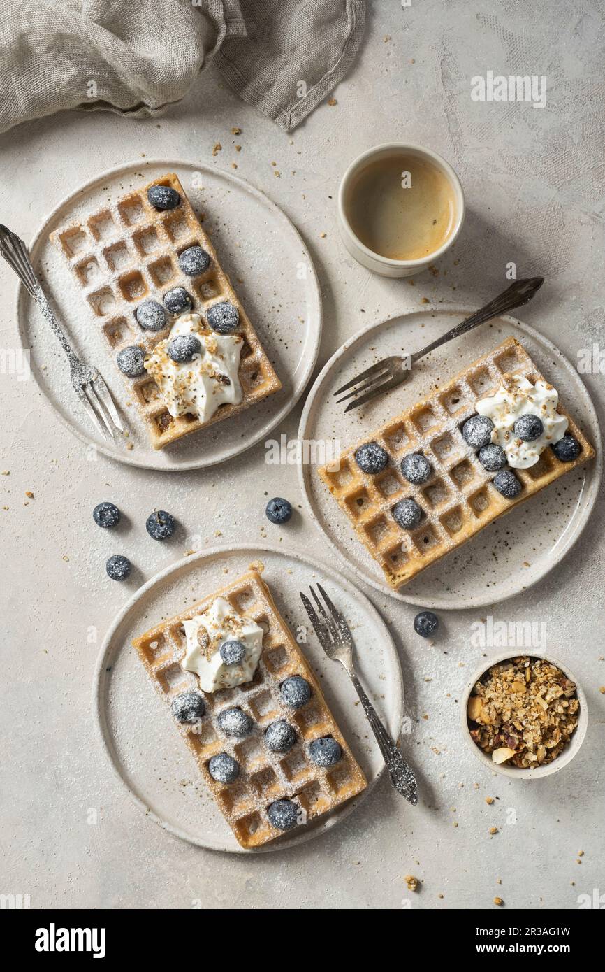 Gluten-free waffles with blueberries and whipped cream Stock Photo - Alamy