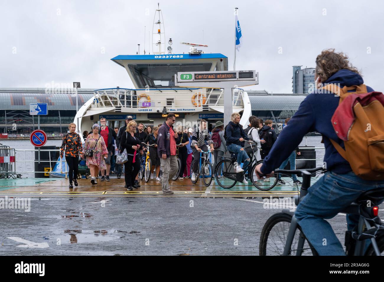 Amsterdam, The Netherlands - 8 September 2022: People leaving a GVB ferryboat Stock Photo