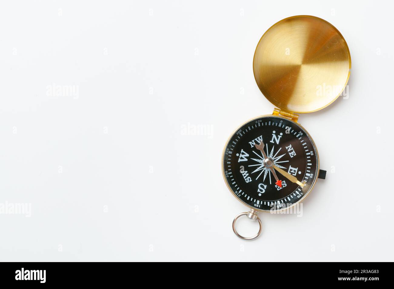 Golden vintage compass isolated on white background Stock Photo - Alamy