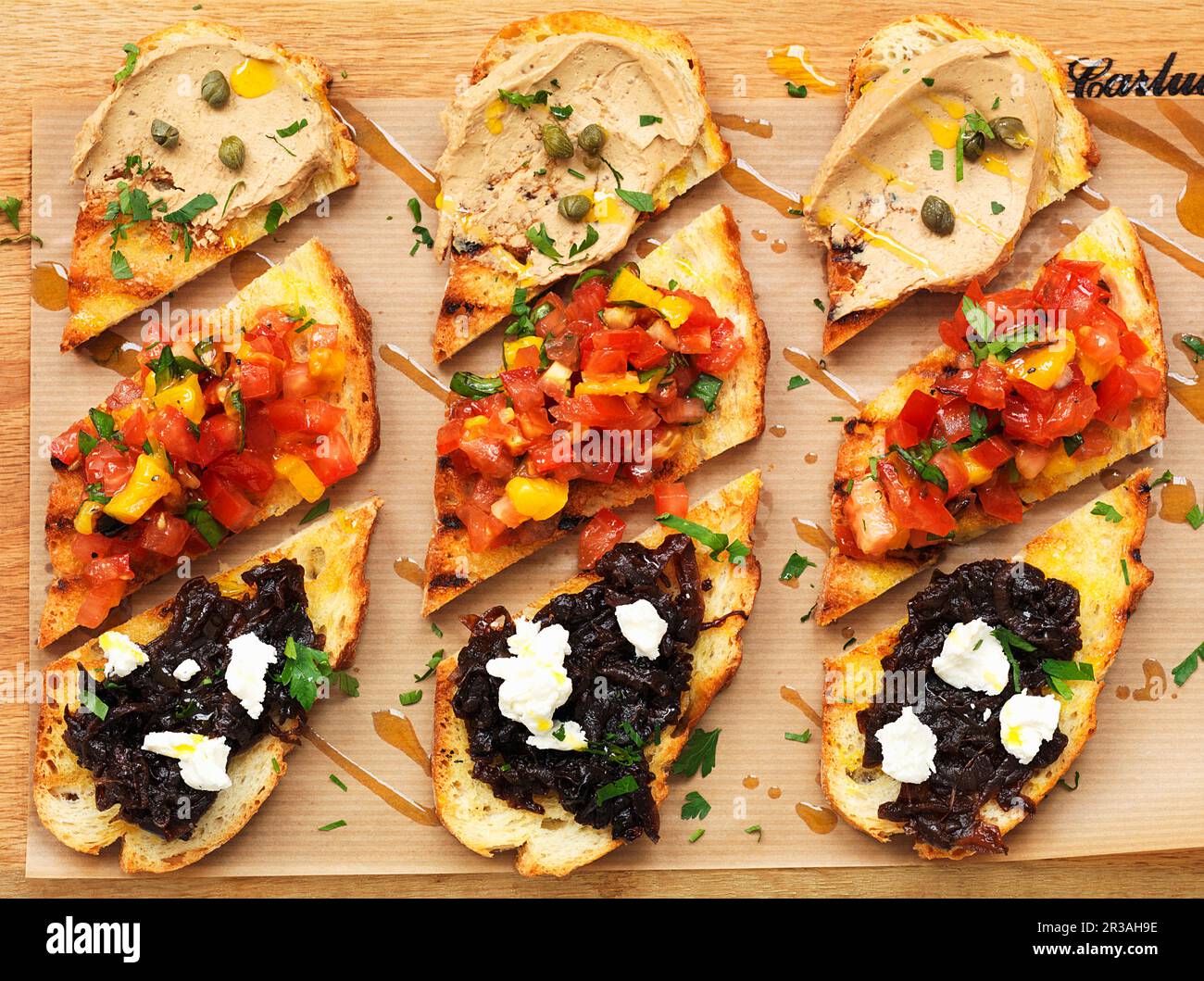Bruschetta with tuna, tomatoes and tapenade Stock Photo Alamy