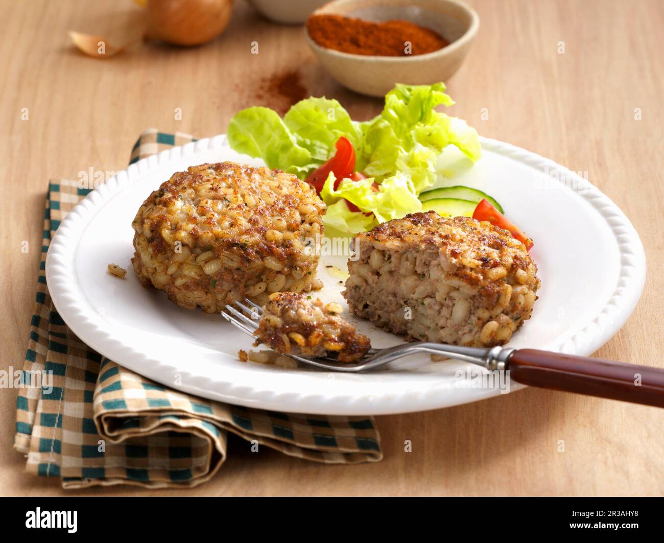 Roast rice cakes with salad Stock Photo - Alamy