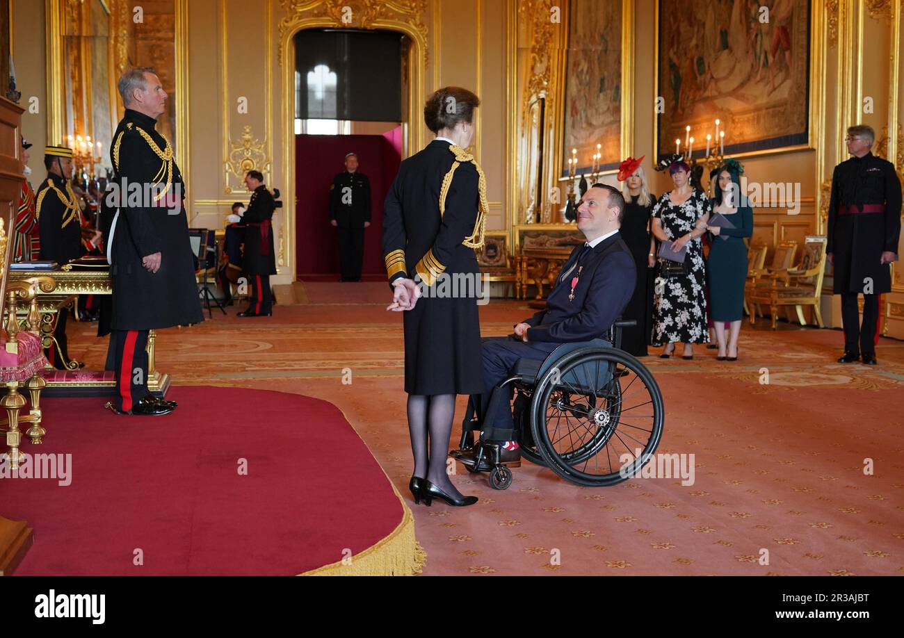 Mr. Ryan Cowling, from Matlock, is made a Member of the Order of the British Empire by the Princess Royal at Windsor Castle. The honour recognises services to wheelchair rugby. Picture date: Tuesday May 23, 2023. Stock Photo