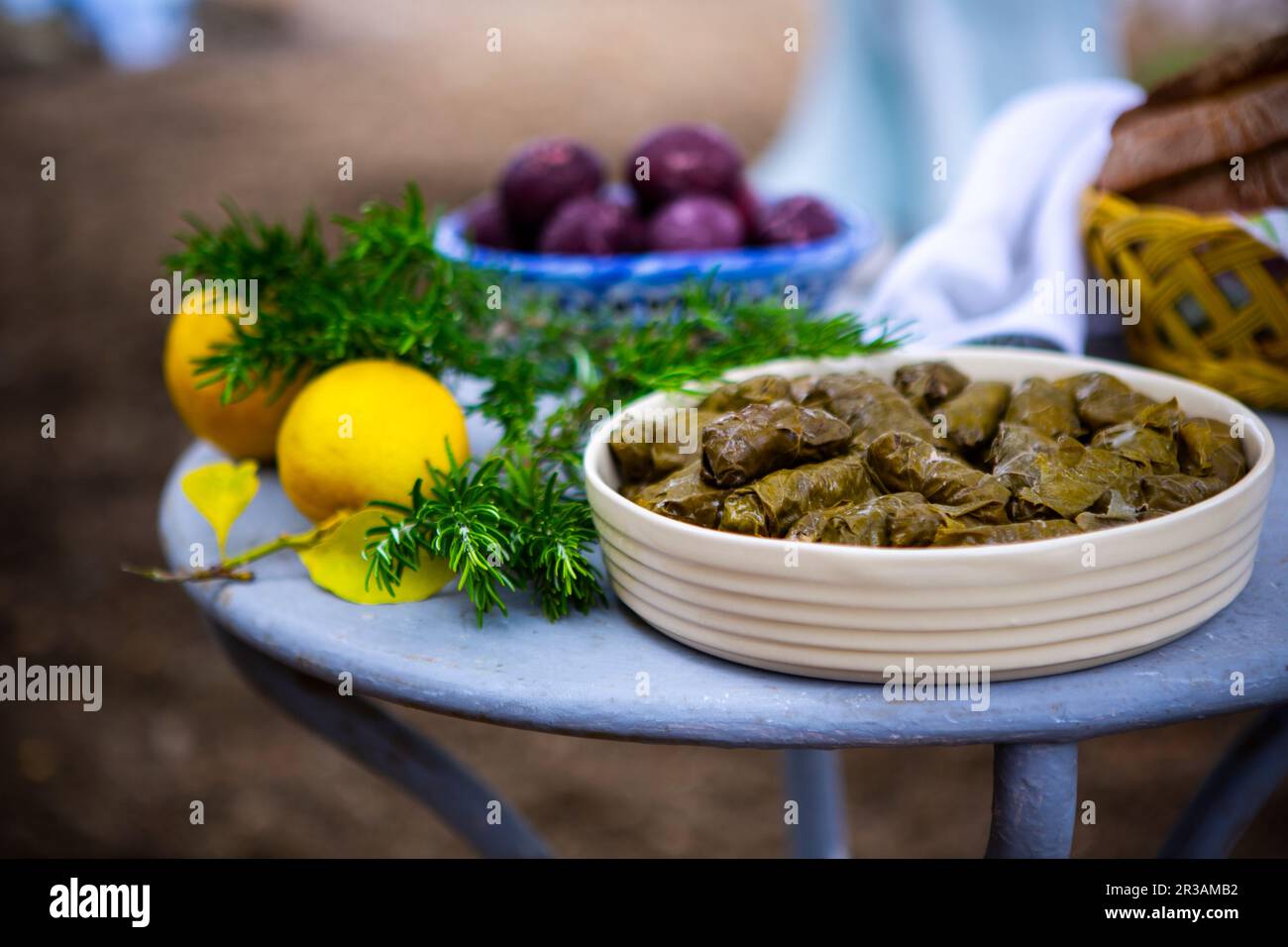 easter table with dolmas, easter eggs and freshly baked bread Stock Photo