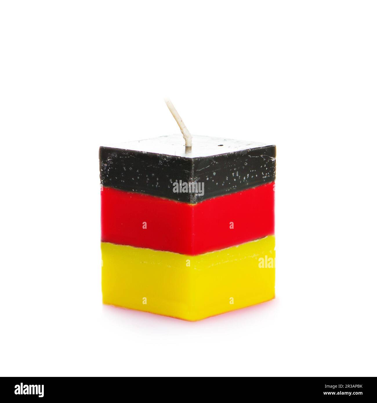 Decorative Handmade candle isolated on white background. Cubeshaped