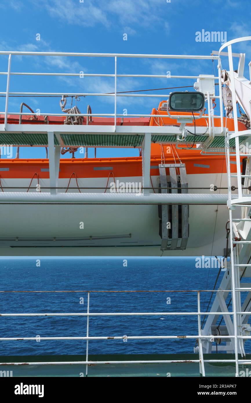 A large passenger ship sits atop the glittering sea, its majestic