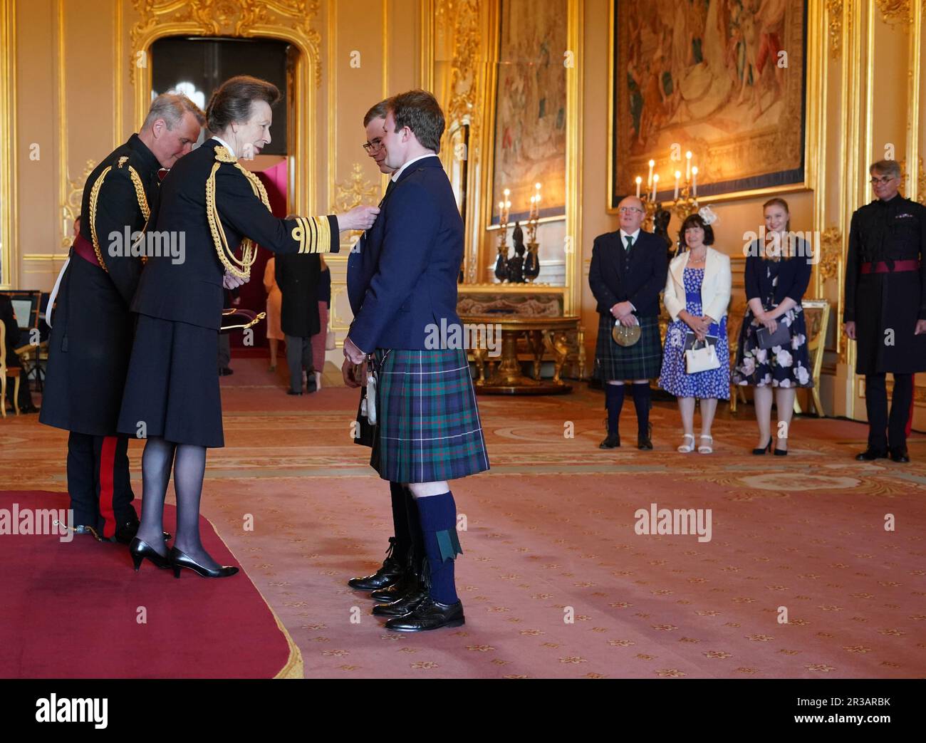 Mr. Andrew Simpson and Mr. Neil Simpson, Para Alpine Skier, from Banchory, are made Members of the Order of the British Empire by the Princess Royal at Windsor Castle. The honour recognises services to skiing. Picture date: Tuesday May 23, 2023. Stock Photo