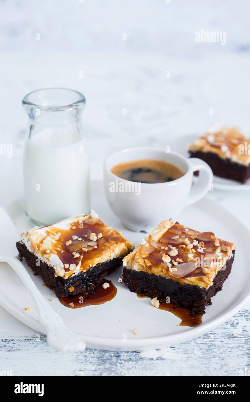 Espresso coffee brownies with caramel sauce Stock Photo Alamy