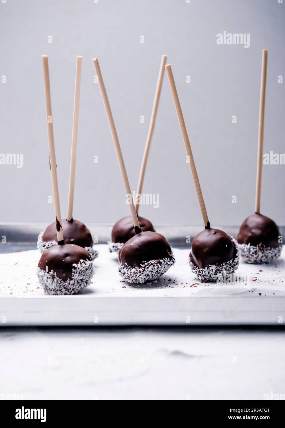Vegan cakepops with rice milk chocolate and grated coconut Stock Photo Alamy