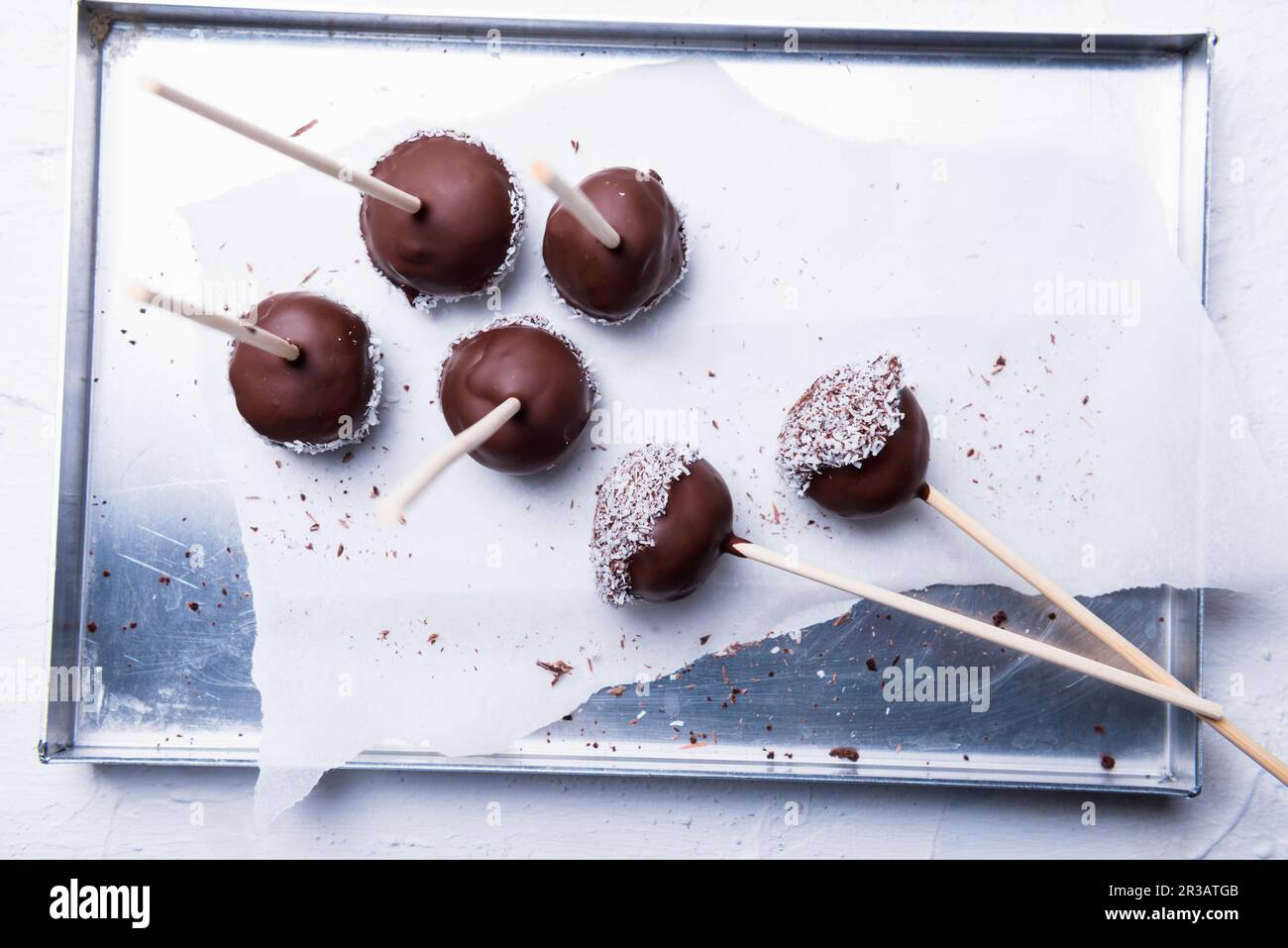 Vegan cakepops with rice milk chocolate and grated coconut Stock Photo Alamy