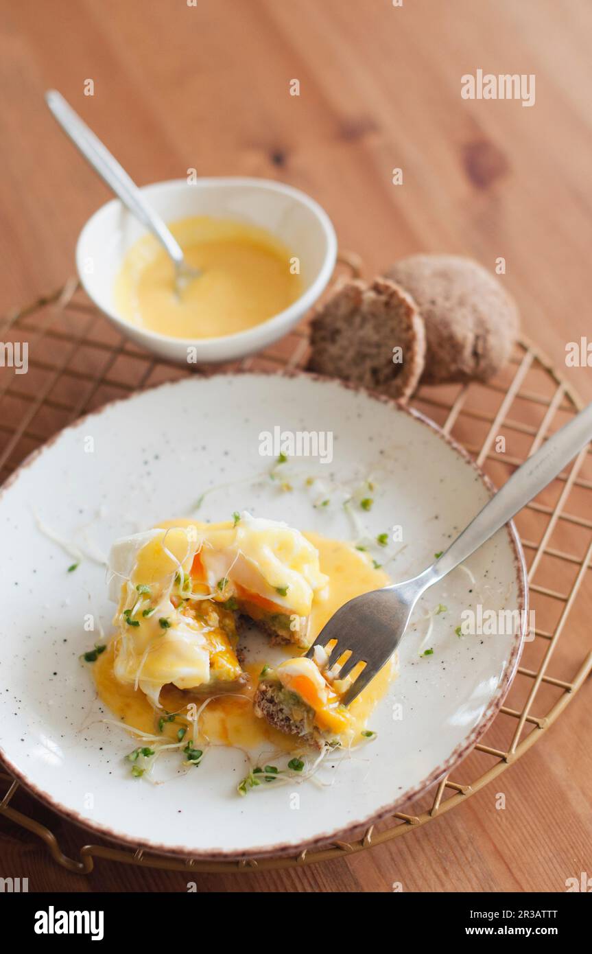 Poached Eggs Benedict on bread Stock Photo